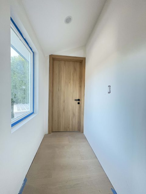 SL Golden Oak interior door installed in a modern residential interior
