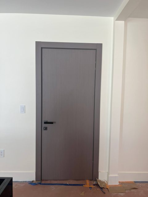 Dark gray wood finish in a minimalist interior