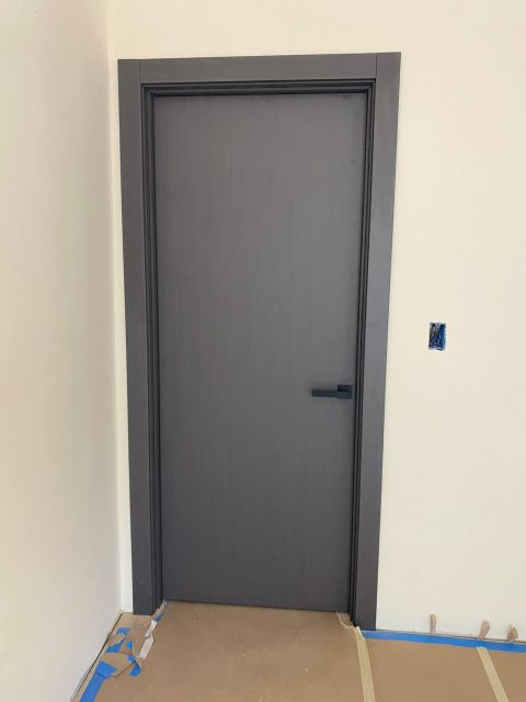 YL-F dark grey interior door installed in a modern residential space